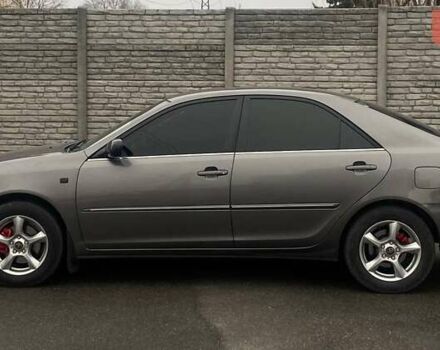 Серый Тойота Камри, объемом двигателя 2.4 л и пробегом 270 тыс. км за 5600 $, фото 4 на Automoto.ua