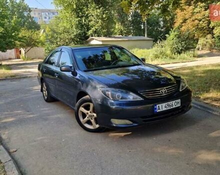 Сірий Тойота Камрі, об'ємом двигуна 2.36 л та пробігом 349 тис. км за 4000 $, фото 4 на Automoto.ua