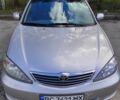 Серый Тойота Камри, объемом двигателя 2.4 л и пробегом 257 тыс. км за 4999 $, фото 1 на Automoto.ua