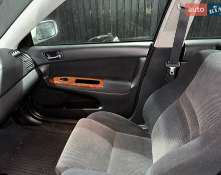 Серый Тойота Камри, объемом двигателя 2.4 л и пробегом 101 тыс. км за 7500 $, фото 12 на Automoto.ua