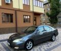 Сірий Тойота Камрі, об'ємом двигуна 2.4 л та пробігом 348 тис. км за 4950 $, фото 1 на Automoto.ua