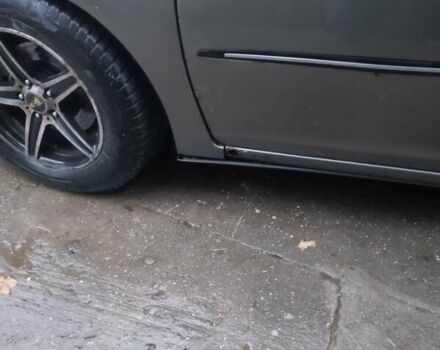 Серый Тойота Камри, объемом двигателя 2.4 л и пробегом 250 тыс. км за 4500 $, фото 6 на Automoto.ua