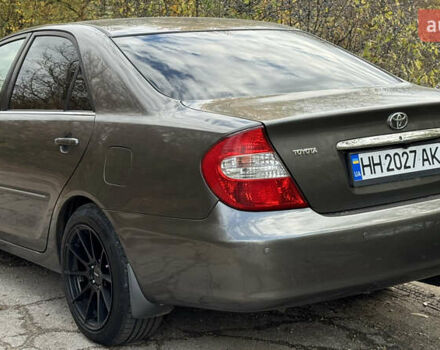 Серый Тойота Камри, объемом двигателя 3 л и пробегом 417 тыс. км за 8000 $, фото 4 на Automoto.ua