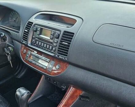 Серый Тойота Камри, объемом двигателя 3 л и пробегом 210 тыс. км за 4800 $, фото 5 на Automoto.ua