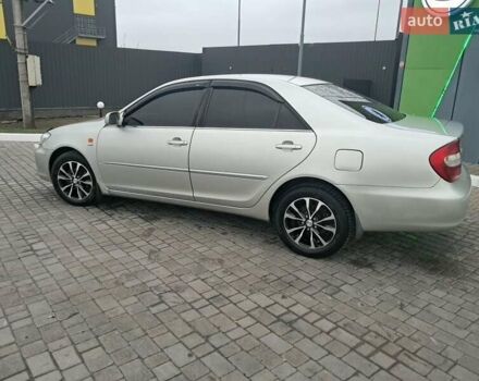 Серый Тойота Камри, объемом двигателя 2.4 л и пробегом 365 тыс. км за 5700 $, фото 2 на Automoto.ua