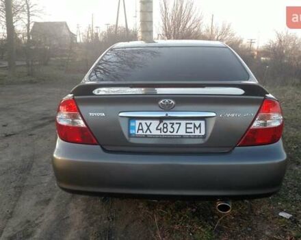 Сірий Тойота Камрі, об'ємом двигуна 2.4 л та пробігом 296 тис. км за 7200 $, фото 2 на Automoto.ua