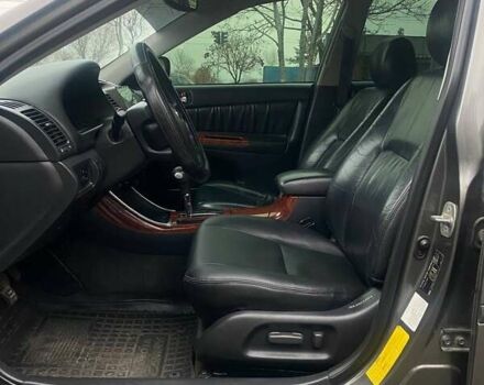 Серый Тойота Камри, объемом двигателя 2.4 л и пробегом 270 тыс. км за 5600 $, фото 12 на Automoto.ua