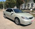 Серый Тойота Камри, объемом двигателя 3 л и пробегом 302 тыс. км за 7700 $, фото 1 на Automoto.ua