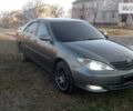 Сірий Тойота Камрі, об'ємом двигуна 2.4 л та пробігом 296 тис. км за 7200 $, фото 1 на Automoto.ua