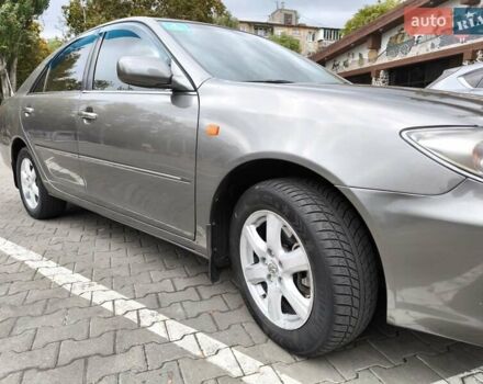 Сірий Тойота Камрі, об'ємом двигуна 3 л та пробігом 284 тис. км за 5700 $, фото 23 на Automoto.ua
