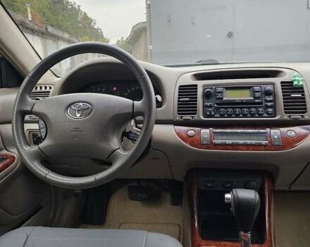 Серый Тойота Камри, объемом двигателя 3 л и пробегом 330 тыс. км за 3100 $, фото 21 на Automoto.ua