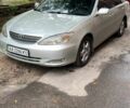 Сірий Тойота Камрі, об'ємом двигуна 3 л та пробігом 218 тис. км за 3698 $, фото 1 на Automoto.ua