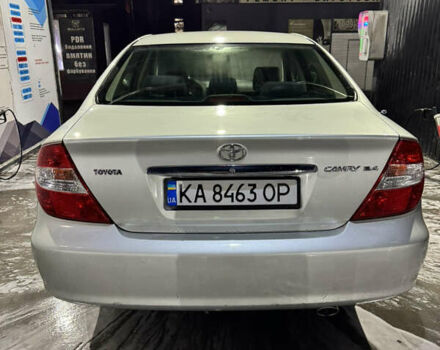 Серый Тойота Камри, объемом двигателя 2.4 л и пробегом 101 тыс. км за 7500 $, фото 1 на Automoto.ua