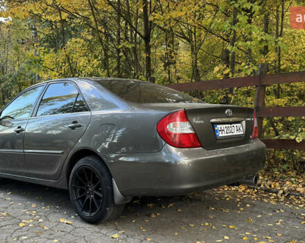 Серый Тойота Камри, объемом двигателя 3 л и пробегом 417 тыс. км за 8000 $, фото 1 на Automoto.ua