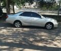Сірий Тойота Камрі, об'ємом двигуна 3 л та пробігом 230 тис. км за 7500 $, фото 1 на Automoto.ua