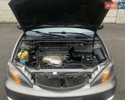 Серый Тойота Камри, объемом двигателя 2.4 л и пробегом 270 тыс. км за 5600 $, фото 16 на Automoto.ua