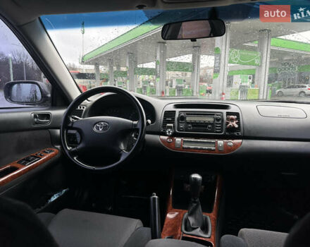 Серый Тойота Камри, объемом двигателя 2.36 л и пробегом 617 тыс. км за 5700 $, фото 19 на Automoto.ua