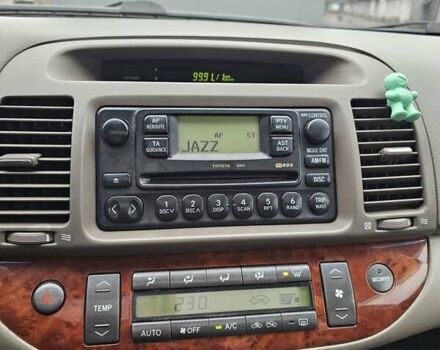 Серый Тойота Камри, объемом двигателя 3 л и пробегом 330 тыс. км за 3000 $, фото 26 на Automoto.ua