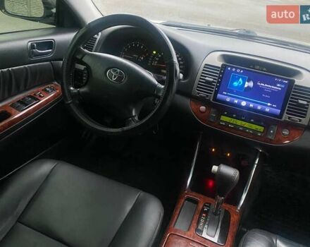 Серый Тойота Камри, объемом двигателя 2.4 л и пробегом 270 тыс. км за 5600 $, фото 10 на Automoto.ua