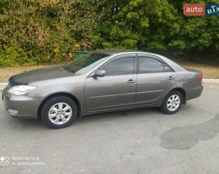 Сірий Тойота Камрі, об'ємом двигуна 2.4 л та пробігом 237 тис. км за 5000 $, фото 1 на Automoto.ua