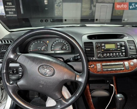 Серый Тойота Камри, объемом двигателя 2.4 л и пробегом 101 тыс. км за 7500 $, фото 7 на Automoto.ua