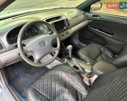 Серый Тойота Камри, объемом двигателя 2.36 л и пробегом 300 тыс. км за 5200 $, фото 18 на Automoto.ua