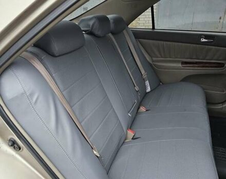 Серый Тойота Камри, объемом двигателя 3 л и пробегом 330 тыс. км за 3000 $, фото 24 на Automoto.ua