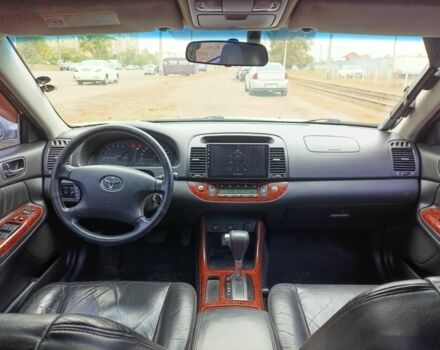 Серый Тойота Камри, объемом двигателя 2.4 л и пробегом 390 тыс. км за 5000 $, фото 6 на Automoto.ua