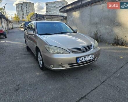 Серый Тойота Камри, объемом двигателя 3 л и пробегом 330 тыс. км за 3100 $, фото 2 на Automoto.ua