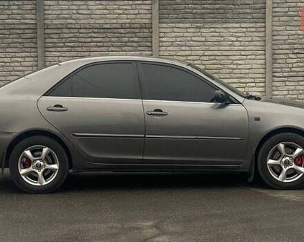 Серый Тойота Камри, объемом двигателя 2.4 л и пробегом 270 тыс. км за 5600 $, фото 3 на Automoto.ua