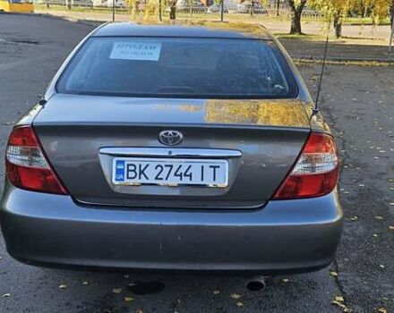 Серый Тойота Камри, объемом двигателя 3 л и пробегом 210 тыс. км за 4800 $, фото 7 на Automoto.ua