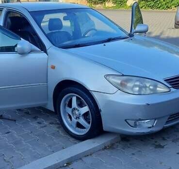 Серый Тойота Камри, объемом двигателя 3 л и пробегом 398 тыс. км за 4900 $, фото 22 на Automoto.ua