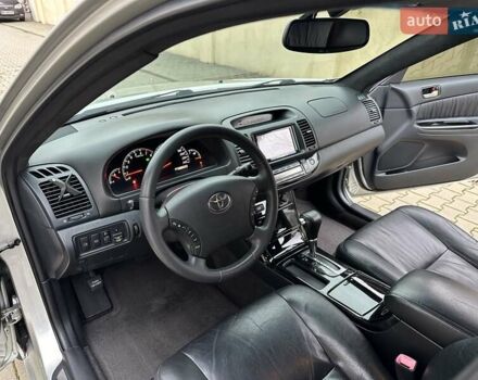 Серый Тойота Камри, объемом двигателя 2.36 л и пробегом 257 тыс. км за 8300 $, фото 45 на Automoto.ua