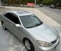 Серый Тойота Камри, объемом двигателя 2.4 л и пробегом 403 тыс. км за 5100 $, фото 1 на Automoto.ua