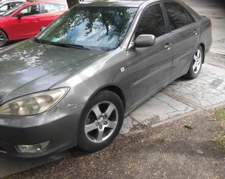 Серый Тойота Камри, объемом двигателя 2.4 л и пробегом 360 тыс. км за 4800 $, фото 2 на Automoto.ua