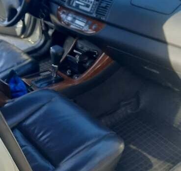 Серый Тойота Камри, объемом двигателя 3 л и пробегом 398 тыс. км за 4900 $, фото 27 на Automoto.ua