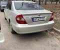Серый Тойота Камри, объемом двигателя 2.4 л и пробегом 273 тыс. км за 5200 $, фото 1 на Automoto.ua