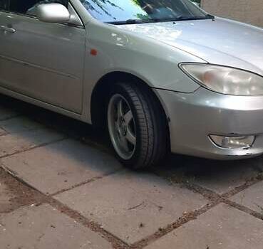 Серый Тойота Камри, объемом двигателя 3 л и пробегом 398 тыс. км за 4900 $, фото 19 на Automoto.ua