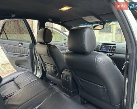 Серый Тойота Камри, объемом двигателя 2.36 л и пробегом 257 тыс. км за 8300 $, фото 56 на Automoto.ua