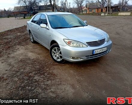 Сірий Тойота Камрі, об'ємом двигуна 2.4 л та пробігом 266 тис. км за 6750 $, фото 2 на Automoto.ua