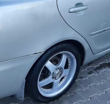 Серый Тойота Камри, объемом двигателя 3 л и пробегом 398 тыс. км за 4900 $, фото 12 на Automoto.ua