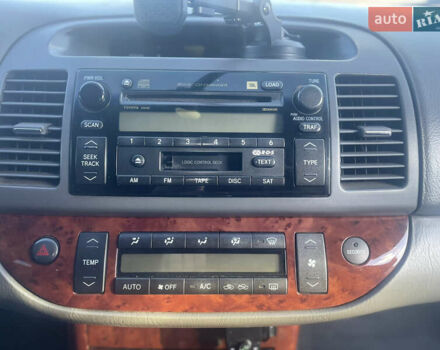 Серый Тойота Камри, объемом двигателя 2.4 л и пробегом 469 тыс. км за 6200 $, фото 26 на Automoto.ua