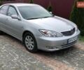 Серый Тойота Камри, объемом двигателя 2.4 л и пробегом 201 тыс. км за 5900 $, фото 1 на Automoto.ua