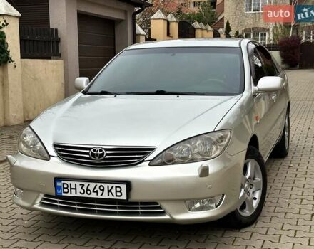 Серый Тойота Камри, объемом двигателя 2.36 л и пробегом 257 тыс. км за 8300 $, фото 3 на Automoto.ua