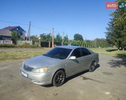 Серый Тойота Камри, объемом двигателя 2.36 л и пробегом 308 тыс. км за 4500 $, фото 1 на Automoto.ua