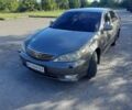 Серый Тойота Камри, объемом двигателя 2.4 л и пробегом 375 тыс. км за 6800 $, фото 1 на Automoto.ua