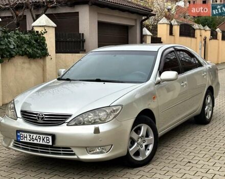 Серый Тойота Камри, объемом двигателя 2.36 л и пробегом 257 тыс. км за 8300 $, фото 1 на Automoto.ua