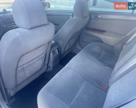 Серый Тойота Камри, объемом двигателя 2.4 л и пробегом 469 тыс. км за 6200 $, фото 19 на Automoto.ua