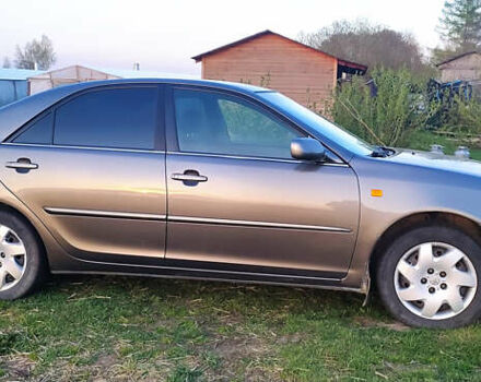 Сірий Тойота Камрі, об'ємом двигуна 2.4 л та пробігом 199 тис. км за 5700 $, фото 1 на Automoto.ua