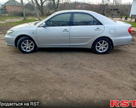 Сірий Тойота Камрі, об'ємом двигуна 2.4 л та пробігом 266 тис. км за 6750 $, фото 4 на Automoto.ua